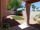Picturesque backyard with desert landscaping, decorative green space and block wall perimeter at 613 Cervantes Dr, Henderson, NV 89014