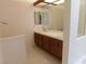 Bathroom with tiled floors, vanity, and standing shower at 613 Cervantes Dr, Henderson, NV 89014