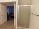 Bathroom with standing shower and doorway at 613 Cervantes Dr, Henderson, NV 89014