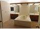 Bathroom with double vanity, tub, and wall mirror at 613 Cervantes Dr, Henderson, NV 89014