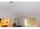 Vaulted ceiling in bedroom with attached bathroom at 613 Cervantes Dr, Henderson, NV 89014