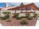 Welcoming community entrance sign with manicured landscaping and desert rock at 613 Cervantes Dr, Henderson, NV 89014