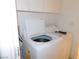 Laundry room with a white washing machine and dryer at 613 Cervantes Dr, Henderson, NV 89014