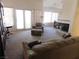 Bright living area featuring a fireplace and access to the dining room at 613 Cervantes Dr, Henderson, NV 89014