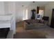 Comfortable living room with cozy fireplace and ample seating at 613 Cervantes Dr, Henderson, NV 89014