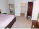This main bedroom has ample storage with a large closet and dressers at 613 Cervantes Dr, Henderson, NV 89014