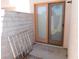 Back patio has sliding glass door and is secured with a metal grate, adding security to the home at 613 Cervantes Dr, Henderson, NV 89014