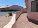 Clean side yard featuring desert landscaping and privacy walls, enhancing outdoor appeal at 613 Cervantes Dr, Henderson, NV 89014