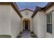 Inviting front entrance featuring a covered walkway and decorative details, creating a warm and welcoming ambiance at 6333 Orto Vaso Ave, Las Vegas, NV 89131