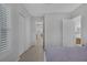 Hallway showcasing easy access to the en suite bathroom and closet spaces at 6333 Orto Vaso Ave, Las Vegas, NV 89131