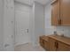 Mud room with built-in storage and bench seating near the home's entrance at 6333 Orto Vaso Ave, Las Vegas, NV 89131