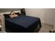 Cozy bedroom with comfortable queen bed and neutral decor at 6361 Copperfield Ave, Las Vegas, NV 89108