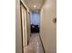 Hallway leading to living area with comfortable sofa at 6361 Copperfield Ave, Las Vegas, NV 89108