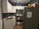 Cozy kitchen with stainless steel appliances and plenty of storage at 6361 Copperfield Ave, Las Vegas, NV 89108