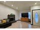 Cozy living room featuring a fireplace and natural light at 6361 Copperfield Ave, Las Vegas, NV 89108