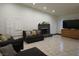Comfortable living room with a fireplace and recessed lights at 6361 Copperfield Ave, Las Vegas, NV 89108