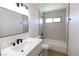 Clean bathroom featuring white marble counters, shower-tub, and modern fixtures at 637 Otono Dr, Boulder City, NV 89005