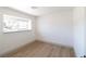 Well-lit bedroom features hardwood floors and bright window at 637 Otono Dr, Boulder City, NV 89005