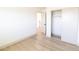 Bedroom featuring walk-in closet and hardwood floors at 637 Otono Dr, Boulder City, NV 89005