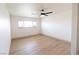 Comfortable bedroom offers bright window and ceiling fan at 637 Otono Dr, Boulder City, NV 89005