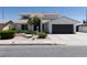 Charming two-story home featuring well-maintained landscaping at 637 Otono Dr, Boulder City, NV 89005