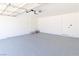 Clean garage with epoxy flooring, ample space, and a garage door opener at 637 Otono Dr, Boulder City, NV 89005