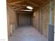 Interior view of the shed featuring wood construction and ample storage space at 637 Otono Dr, Boulder City, NV 89005