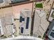 An aerial view showcases a home with solar panels and desert landscaping at 6611 Dove Point Pl, Las Vegas, NV 89130