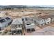 Aerial shot featuring a desert landscaped neighborhood with mountain views in the distance at 6611 Dove Point Pl, Las Vegas, NV 89130