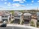 Aerial view of a residential neighborhood featuring well-maintained homes and landscaping at 6611 Dove Point Pl, Las Vegas, NV 89130