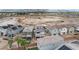 An aerial view featuring house with desert landscaping, mountain views and solar panels at 6611 Dove Point Pl, Las Vegas, NV 89130