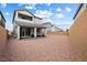 The gravel backyard is spacious and private with a covered patio for outdoor enjoyment at 6611 Dove Point Pl, Las Vegas, NV 89130