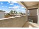 This balcony offers fresh air and neighborhood views to enjoy during any time of day at 6611 Dove Point Pl, Las Vegas, NV 89130