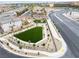 Aerial view of community park showing turf lawns, paths, and landscaping near residential area at 6611 Dove Point Pl, Las Vegas, NV 89130
