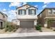 Charming home with a two-car garage and well-manicured landscaping in a residential area at 6611 Dove Point Pl, Las Vegas, NV 89130