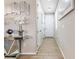 A pristine hallway with stylish decor, light wood flooring, and ample natural light at 6611 Dove Point Pl, Las Vegas, NV 89130
