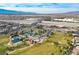 Aerial view of the community park, featuring a pond, walking paths, and a playground at 6834 Fallen Rock St, North Las Vegas, NV 89084