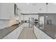 Beautiful kitchen features stainless steel appliances, ample counter space, and sleek cabinetry for a modern feel at 6834 Fallen Rock St, North Las Vegas, NV 89084