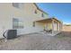 Exterior backyard view showcasing the covered patio and outdoor living area at 6844 Tropicaire St, Las Vegas, NV 89149
