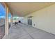 Covered patio offers outdoor living space, featuring access to the backyard at 6844 Tropicaire St, Las Vegas, NV 89149