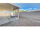 Outdoor covered patio featuring a table and chairs providing the perfect relaxation spot at 6844 Tropicaire St, Las Vegas, NV 89149