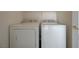 White laundry machines inside of laundry area at 6844 Tropicaire St, Las Vegas, NV 89149