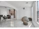 Expansive living area featuring light-colored floors and neutral walls for modern living at 7194 Clear Range Ave, Las Vegas, NV 89178
