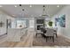 Elegant dining area featuring a modern chandelier and stylish decor at 7460 Desert Flame Ct, Las Vegas, NV 89149