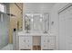 This primary bathroom showcases a luxurious walk-in shower and double vanity at 7460 Desert Flame Ct, Las Vegas, NV 89149