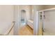 Bathroom with tile floors, a double vanity, a glass-enclosed shower, and doorway leading to bedroom at 76 Stock Option St # 2, Henderson, NV 89074