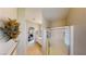 Bright bathroom featuring a glass shower, vanity, and doorway to the main bedroom at 76 Stock Option St # 2, Henderson, NV 89074