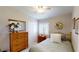Charming bedroom features a comfortable bed, dresser, closet, and a window with lots of light at 76 Stock Option St # 2, Henderson, NV 89074