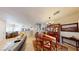Inviting dining area features a wooden table with seating for six and a stylish hutch at 76 Stock Option St # 2, Henderson, NV 89074