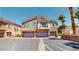 Charming townhome with a two-car garage and a cute balcony on the second floor at 76 Stock Option St # 2, Henderson, NV 89074